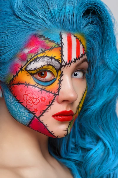 Young beautiful girl with a pattern on the face — Stock Photo, Image