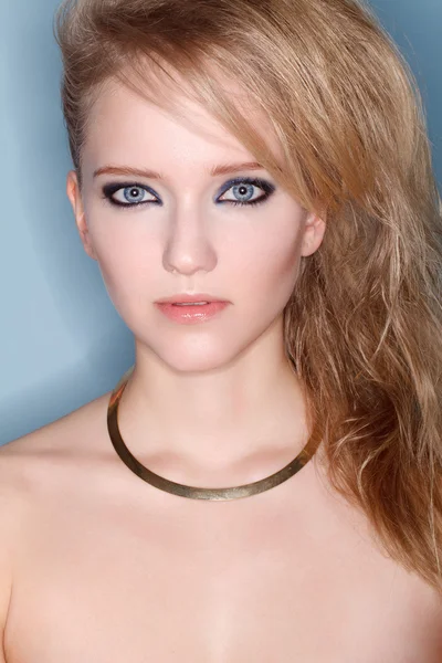 Portrait of young beautiful blond woman with smokey eyes — Stock Photo, Image