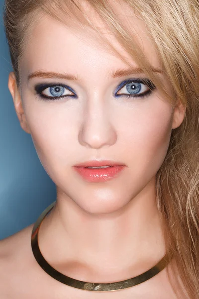 Portrait of young beautiful blond woman with smokey eyes — Stock Photo, Image