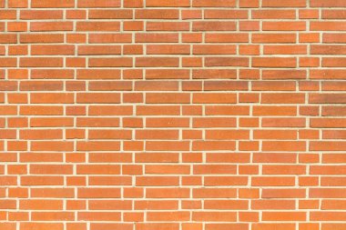 gri dikişleri ile tuğla kırmızı duvar