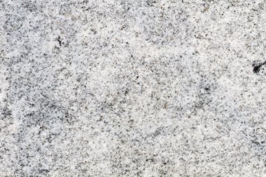 Beyaz granit yapı olarak işlenmiş bir taş