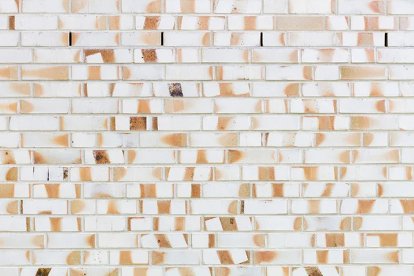 Bright wall of bricks in yellow and orange — Stock Photo, Image