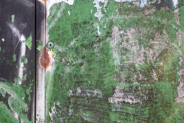 Superfície Grunge pintada em flocos verdes — Fotografia de Stock