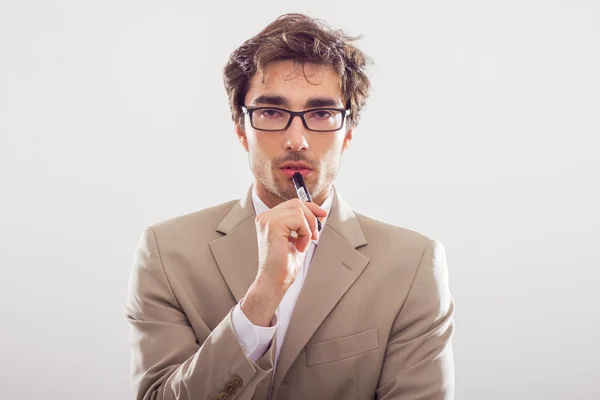 Joven hombre de negocios con marcador — Foto de Stock