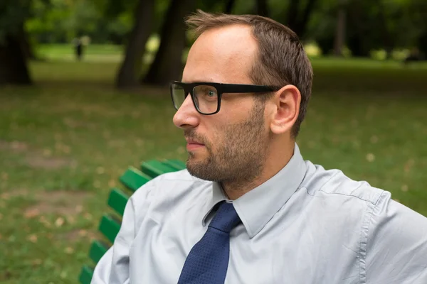 Businessman at park — Stock Photo, Image