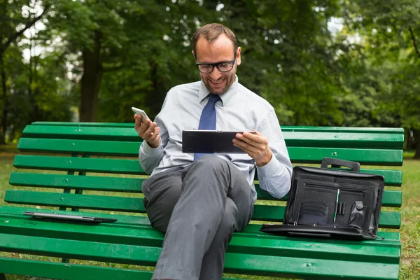 Businessman with tablet — Stock Photo, Image