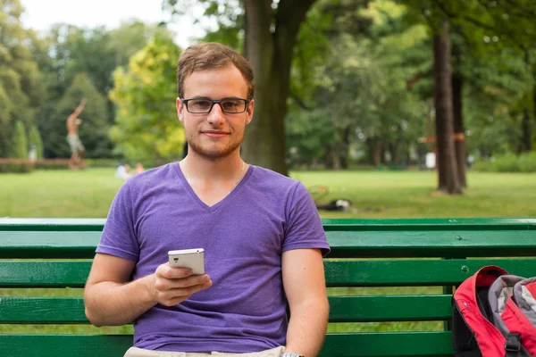 Student on bench — Stock Photo, Image