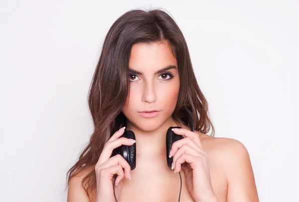 Mulher com fones de ouvido — Fotografia de Stock