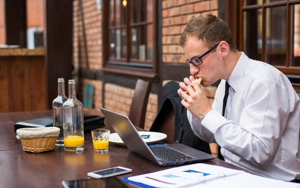 Businessman in restaurant — Stock Photo, Image