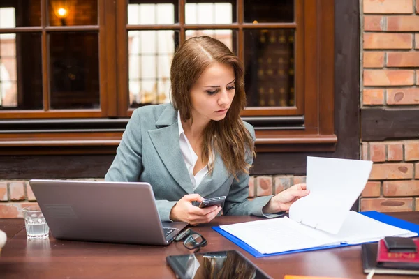 Businesswoman in restaurant — Stock Photo, Image