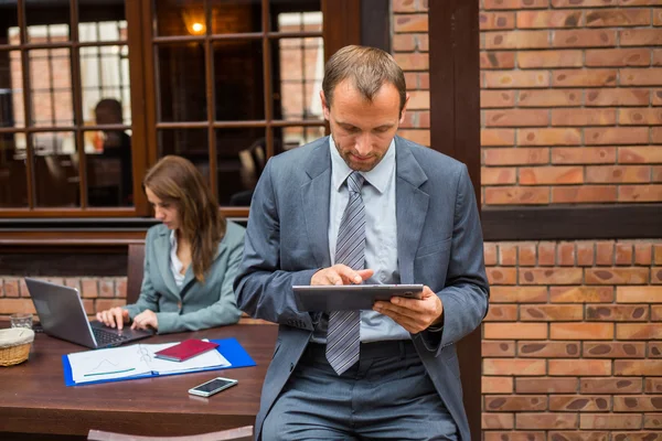 Hard working boss with his secretary — Stock Photo, Image