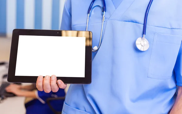 Doctor holding tablet — Stok fotoğraf