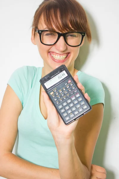 Žena hospodářství kalkulačka — Stock fotografie