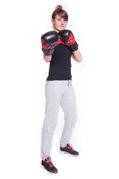 Woman wearing boxing gloves — Stock Photo, Image