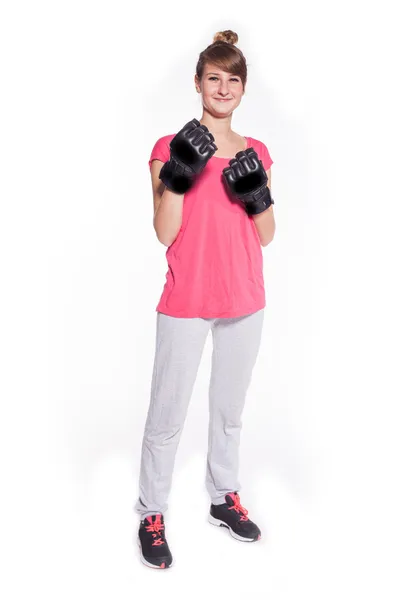 Woman wearing kickboxing gloves — Stock Photo, Image