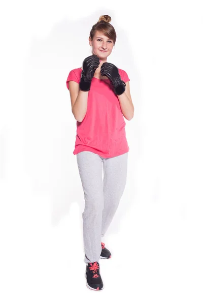 Woman wearing kickboxing gloves — Stock Photo, Image