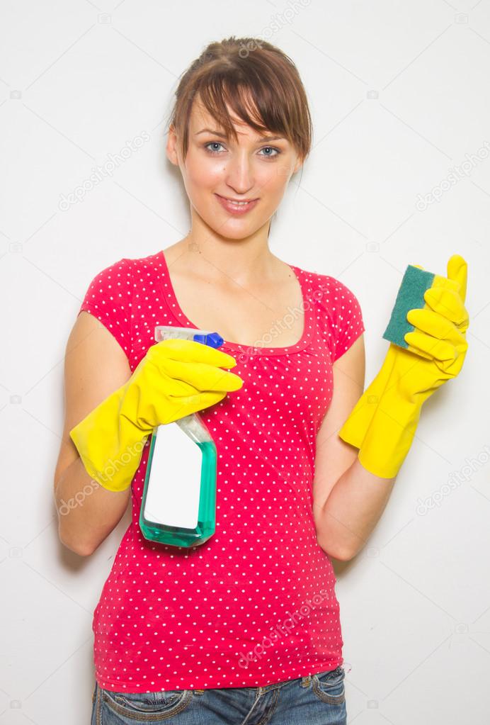 Woman with gloves, sponge and cleaning product