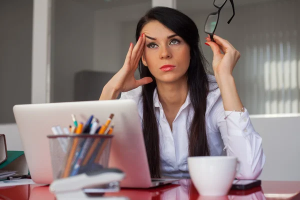 Exhausted businesswoman — Stock Photo, Image