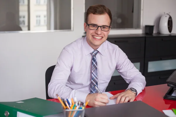 Young businessman in office — Stock Photo, Image