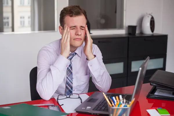 Desperate young businessman — Stock Photo, Image