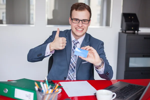 Businessman holding business card — Stock Photo, Image