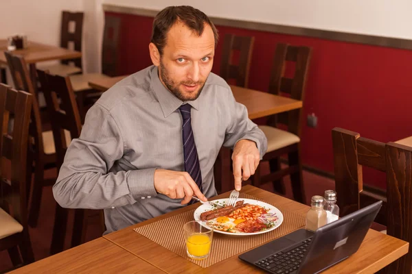 Businessman having lunch — Stock Photo, Image