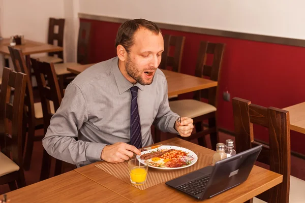 Businessman having lunch — Stock Photo, Image