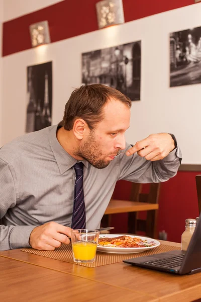 Businessman having lunch — Stock Photo, Image