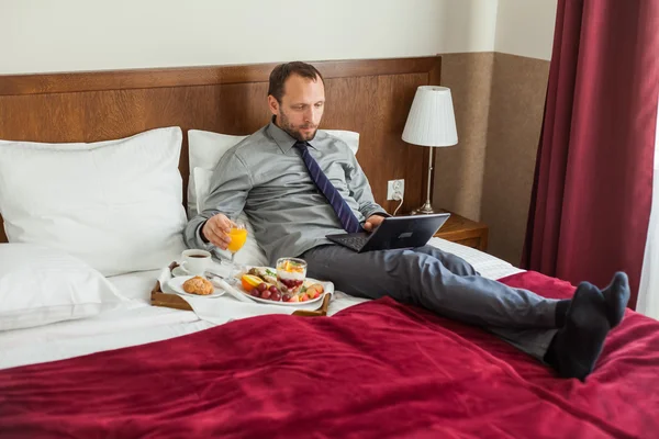 Businessman having breakfast — Stock Photo, Image