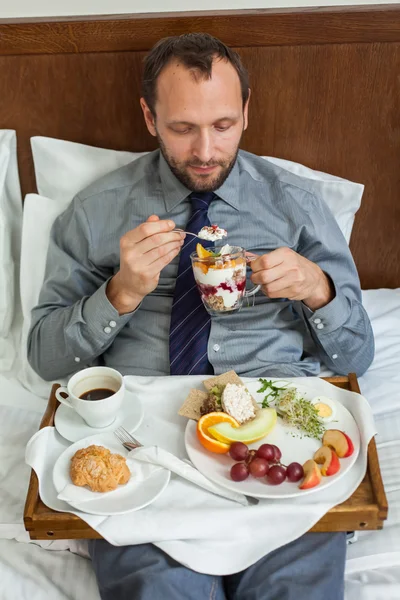 Businessman having breakfast — Stock Photo, Image