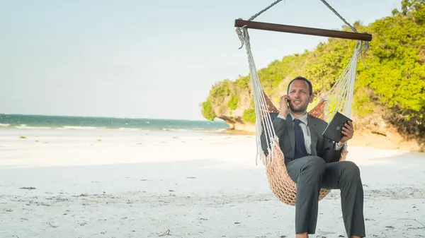 Businessman on beach — Stock Photo, Image