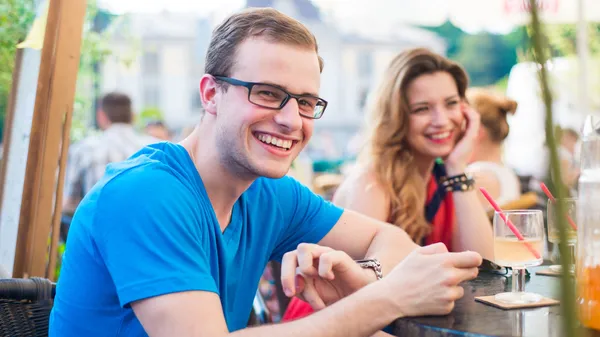 Man and woman in cafe — Stock Photo, Image