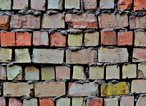 Een ziek-bakstenen huis muur — Stockfoto