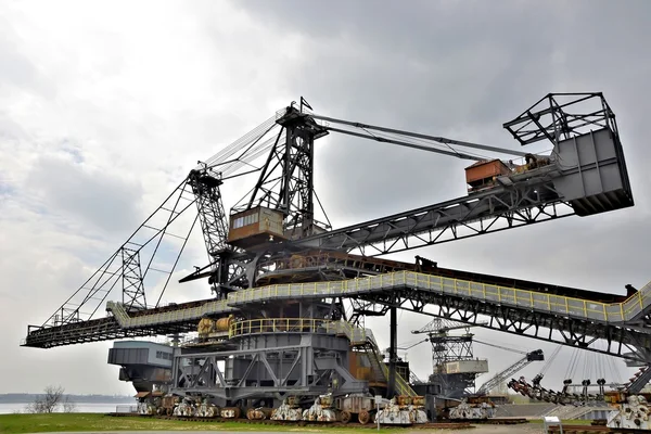 Coal digger is in a disused mine — Stock Photo, Image