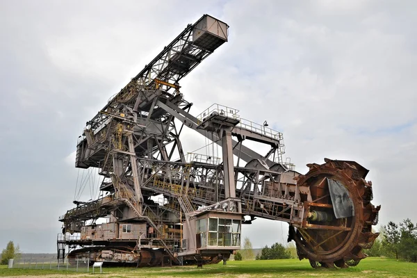 Coal digger is in a disused mine — Stock Photo, Image