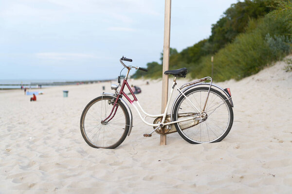  Bicycle on the beach of the Polish Baltic Sea near Kolobrzeg                              