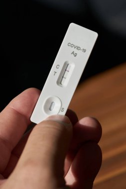 Self-conducted Corona antigen rapid test with a positive test result                              