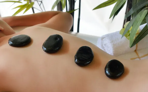 Black hot stone massage — Stock Photo, Image