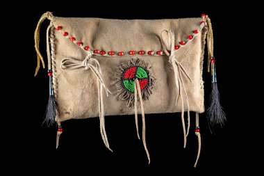 Bag of the North American Indians. Made from skin embroidered with colorful glass beads and leather cords