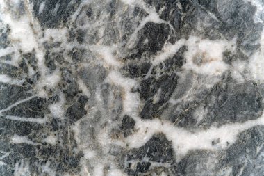 Matt black white marble sanded with scratches as background