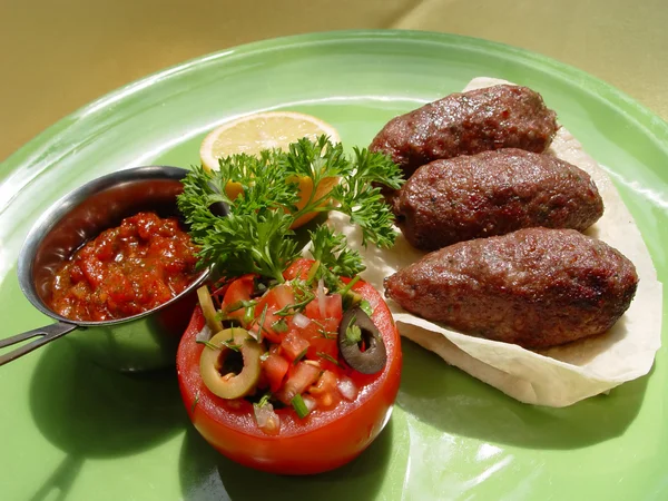 Chops with stuffed tomato — Stock Photo, Image