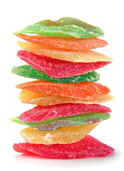 Fruta cristalizada multicolor closeup heap em branco — Fotografia de Stock
