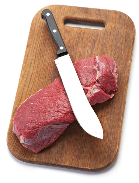 Говяжье мясо с ножом — стоковое фото