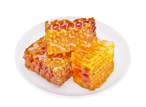 Honeycomb in plate — Stock Photo, Image