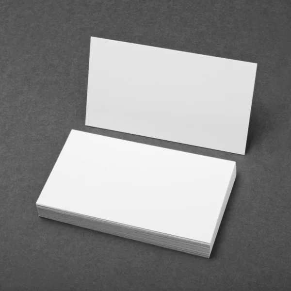 Blank business cards on gray background — Stock Photo, Image