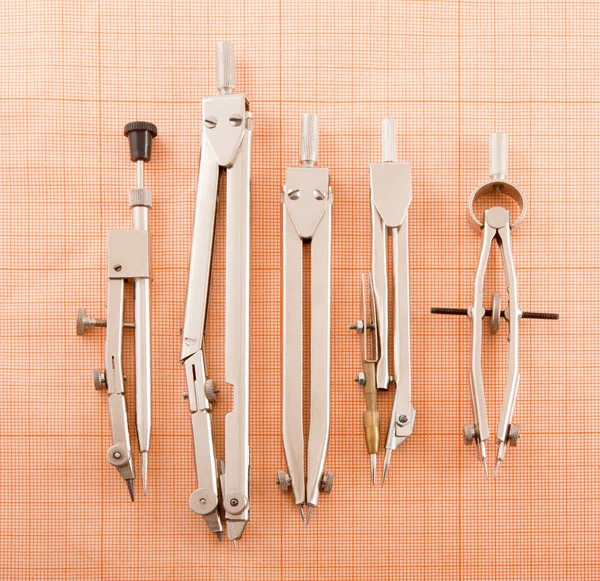 Instruments for drawing on a graph paper. — Stock Photo, Image