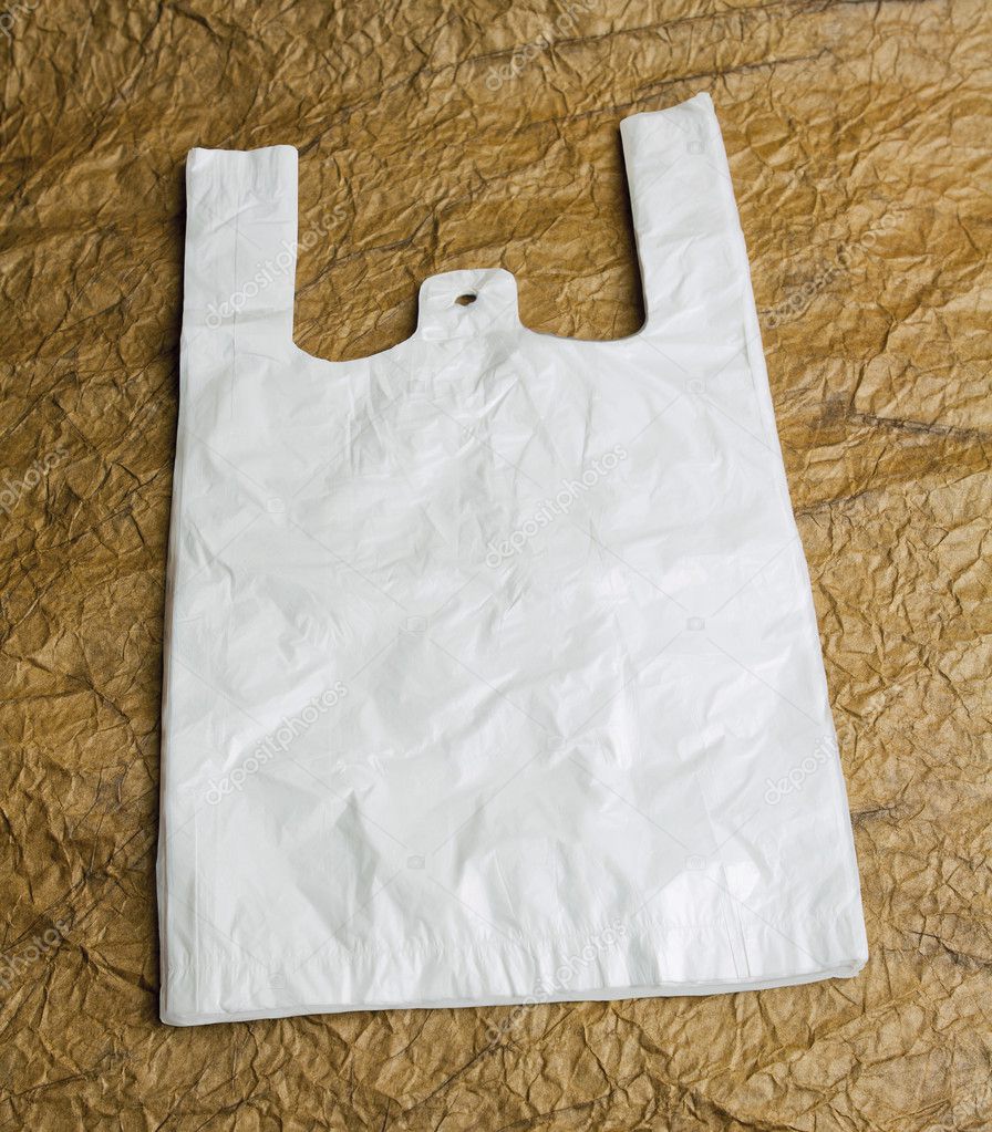 White bags with handle on brown design paper