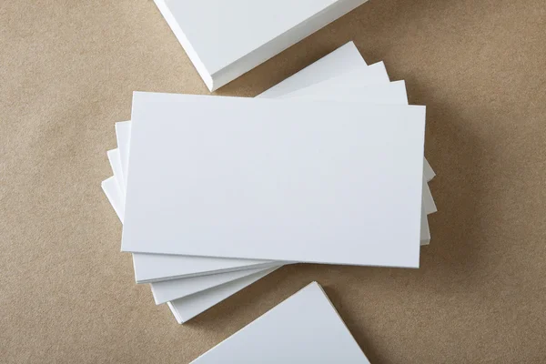 Stack of blank white business cards on crafts background. — Stock Photo, Image