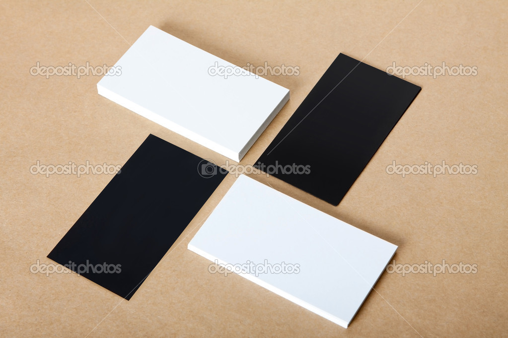 Blank white and black business cards crafts background.