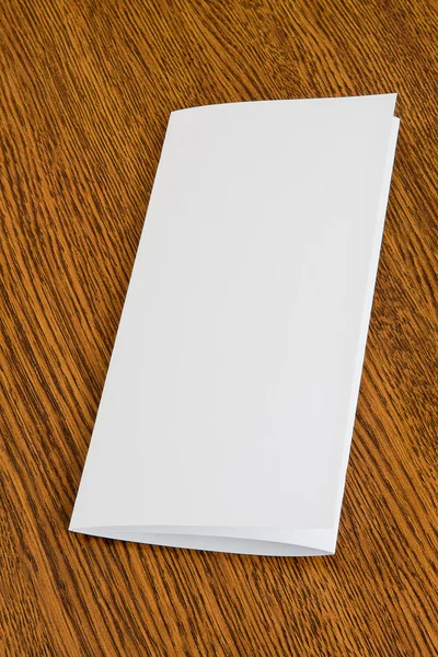 Blank white folding paper flyer — Stock Photo, Image